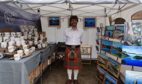 Angus Grant Art craft fair stall kilted